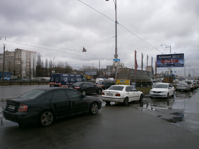 Щит 6x3,  Кільцева дорога, км 2+955 справа (паркінг "Тиса", Приват Банк, "Фора", автосалон "Skoda"), в напрямку Одеське шосе