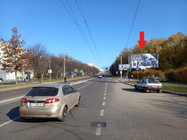 Щит 6x3,  Любінська вул., навпроти будинку № 160, (Скнилівський парк, автостоянка), в напрямку центра міста