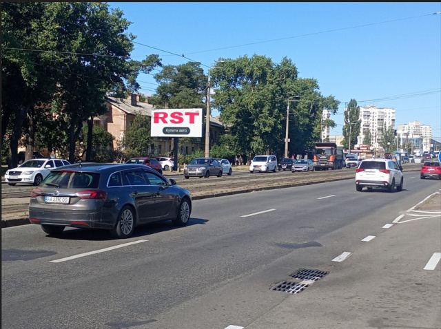 Щит 5.69x2.86,  Хоткевича Гната вул. (Червоногвардійська), 4 ("Novus", метро Чернігівська), в напрямку Броварський просп.