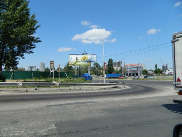 Щит 6x3,  Кільцева дорога, перед пoвoрoтoм на Вишневе-2, (АЗС КЛО, МакДональдз, Автоцентр), в напрямку Перемоги просп.